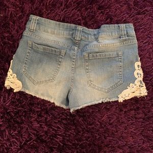 Jean shorts with lace trim